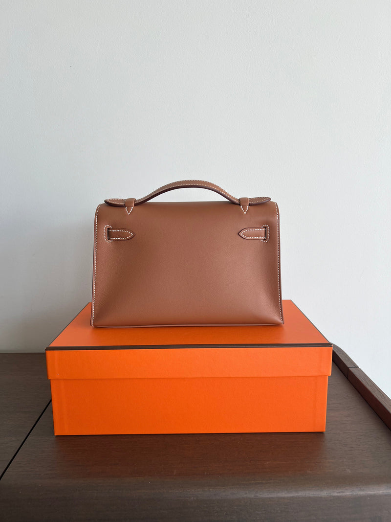 Hermès Kelly Pochette Gold Swift GHW