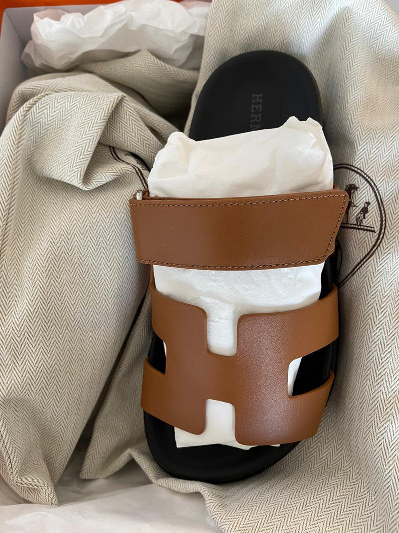 Hermès Chypre Sandals (Naturel/Black)