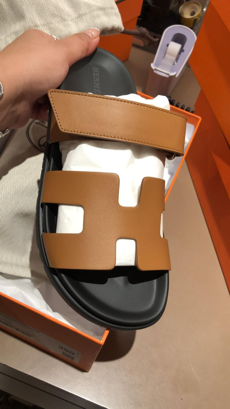 Hermès Chypre Sandals (Naturel/Black)